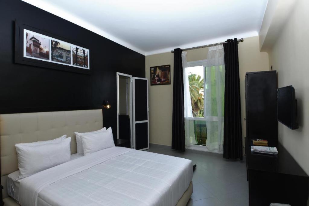 Amor Hotel Фес Экстерьер фото